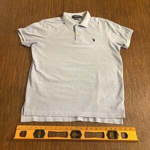 U.S. Polo Assn Blue Polo 
Size: Large 
Color Light Blue 
Shipped Fast 
Measureme
